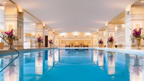 An image of an indoor pool at a resort spa