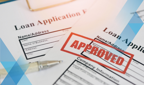 loan application papers with red approved stamp, blue overlay