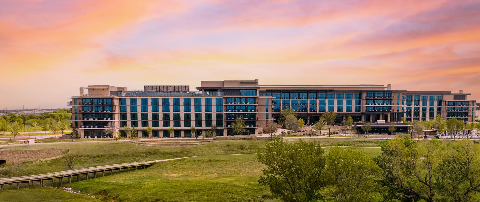 View of the entrance to the Westin La Paloma Resort and Spa in Tucson, AZ on an evening's setting sun