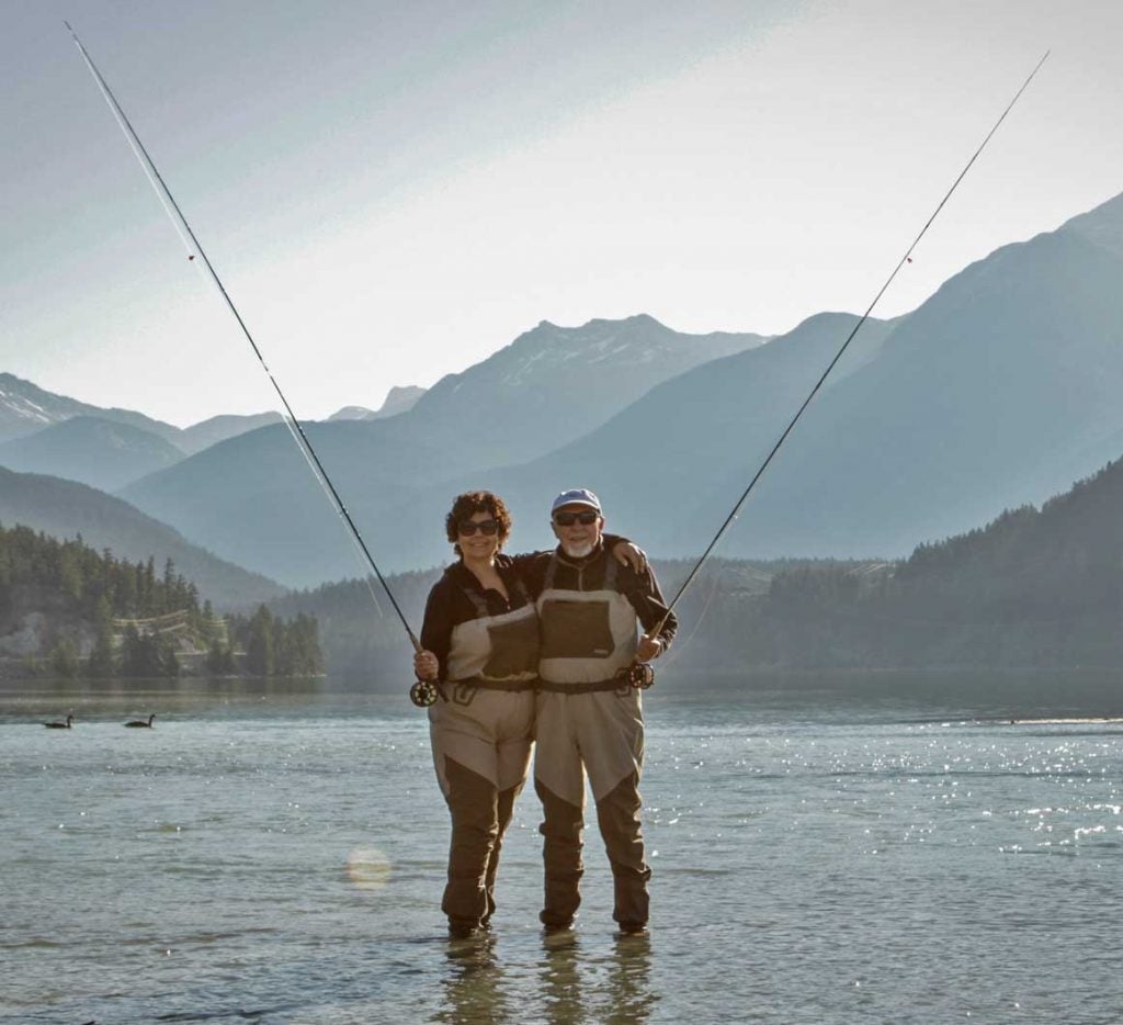 Two people fly fishing